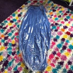 Blue dress with sequins on shoulder and sparkles